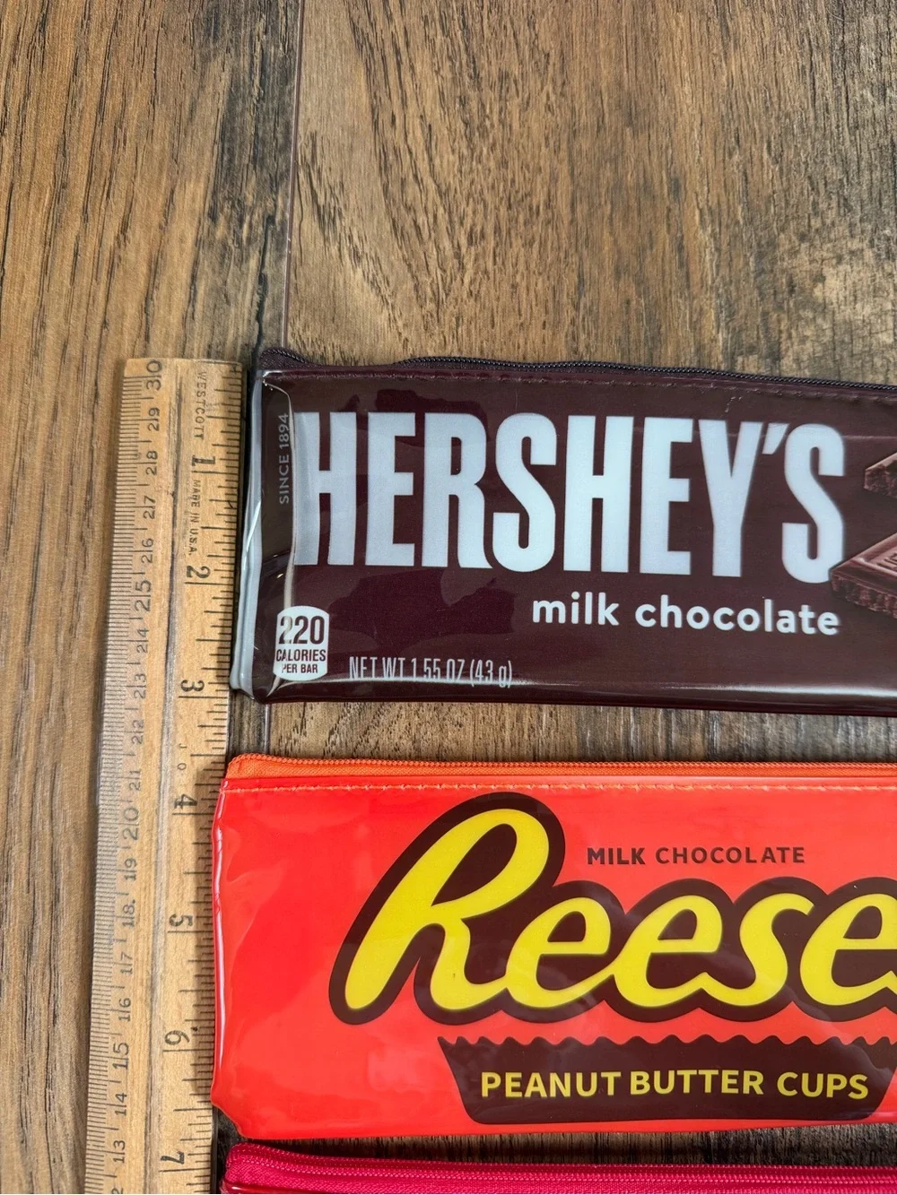 NWT Candy bar logo zipper pouches